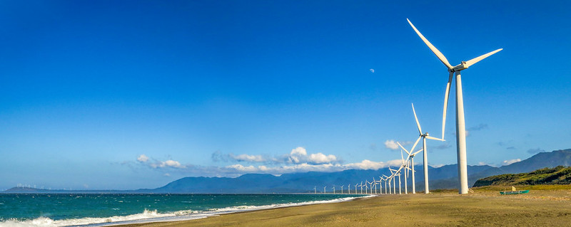 A photo of wind turbines on a beach in Bangui, Ilocos Norte, Philippines